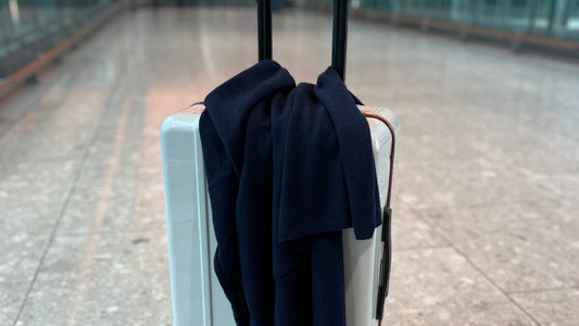 Navy blue cashmere travel wrap at the airport