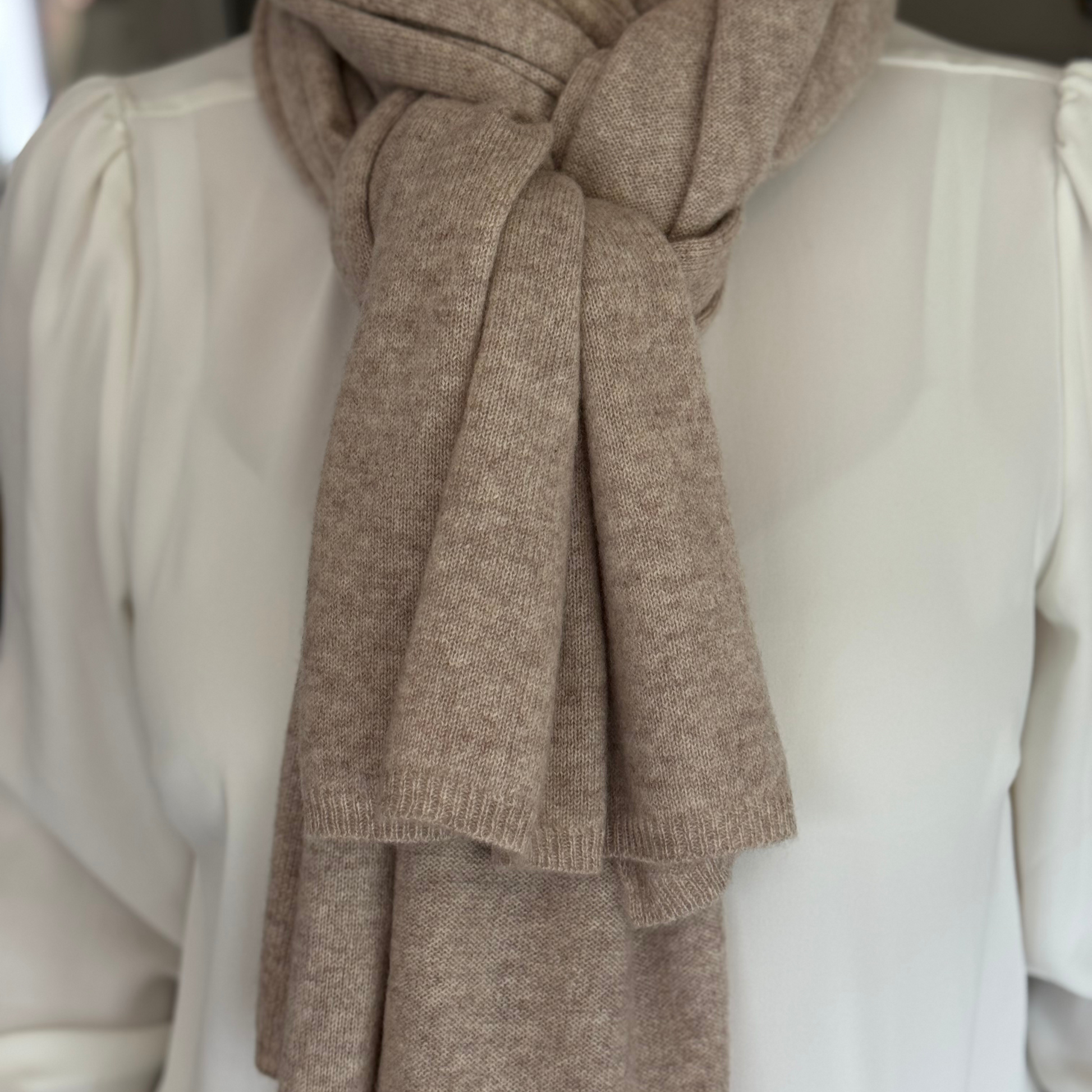 Sand beige cashmere travel wrap styled