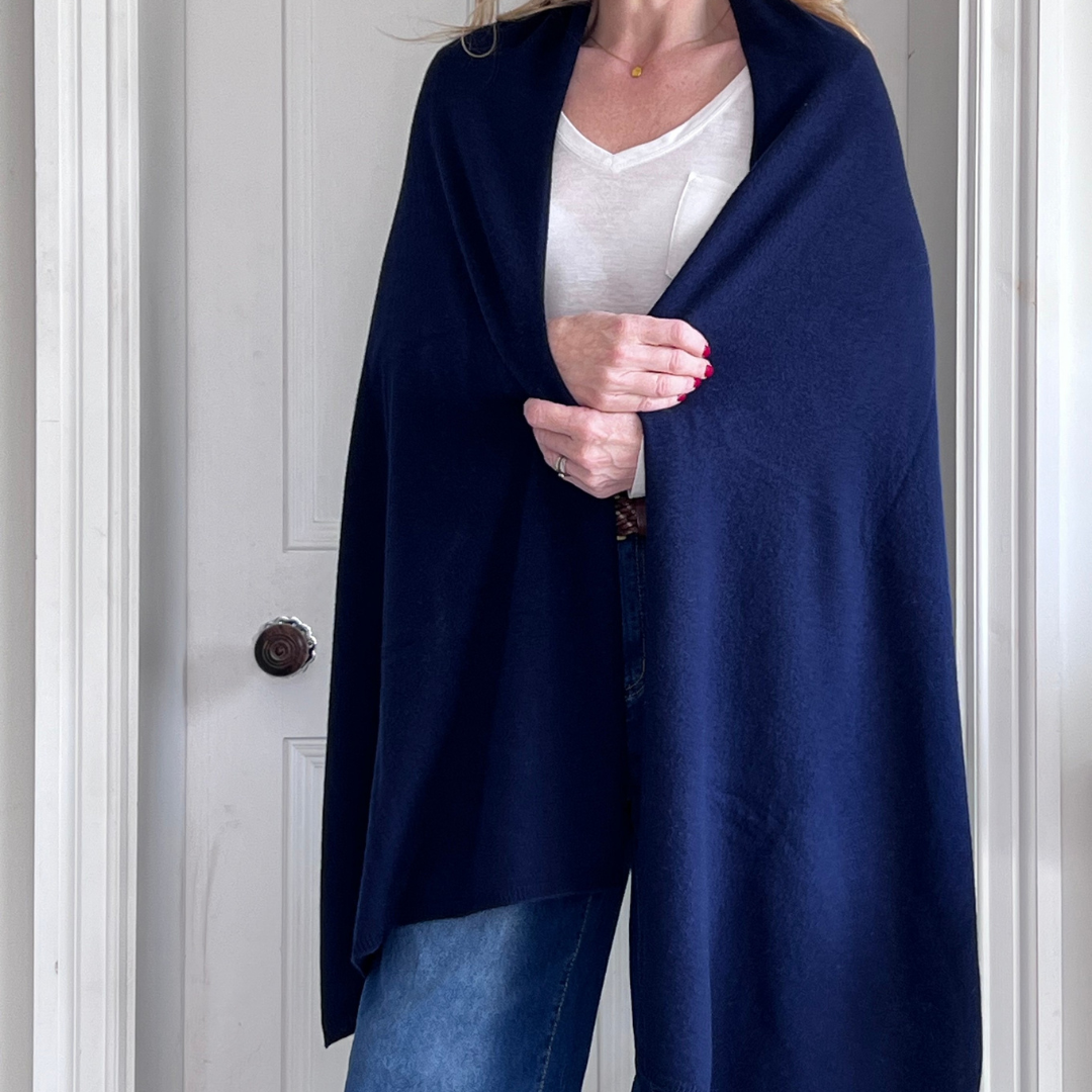 Navy blue cashmere wrap worn with jeans and white top